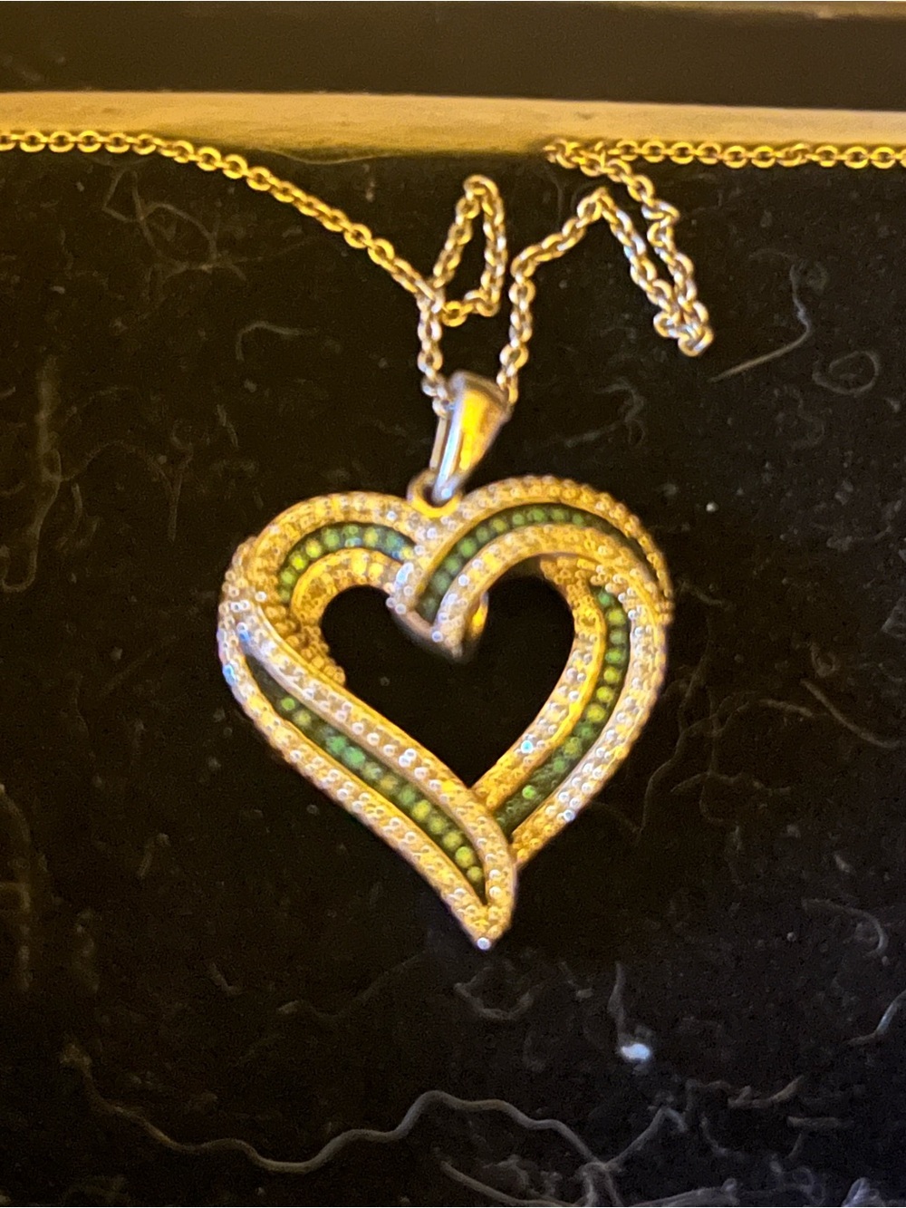 Sterling Silver heart shaped necklace featuring blue and white diamonds BNIB
